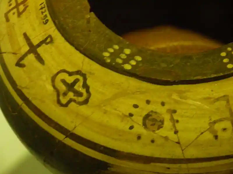 Amorphous solar circle, sun, pre-christian cross on the mouth of a vase, located at Archaeological Museum of Izmir, Turkey